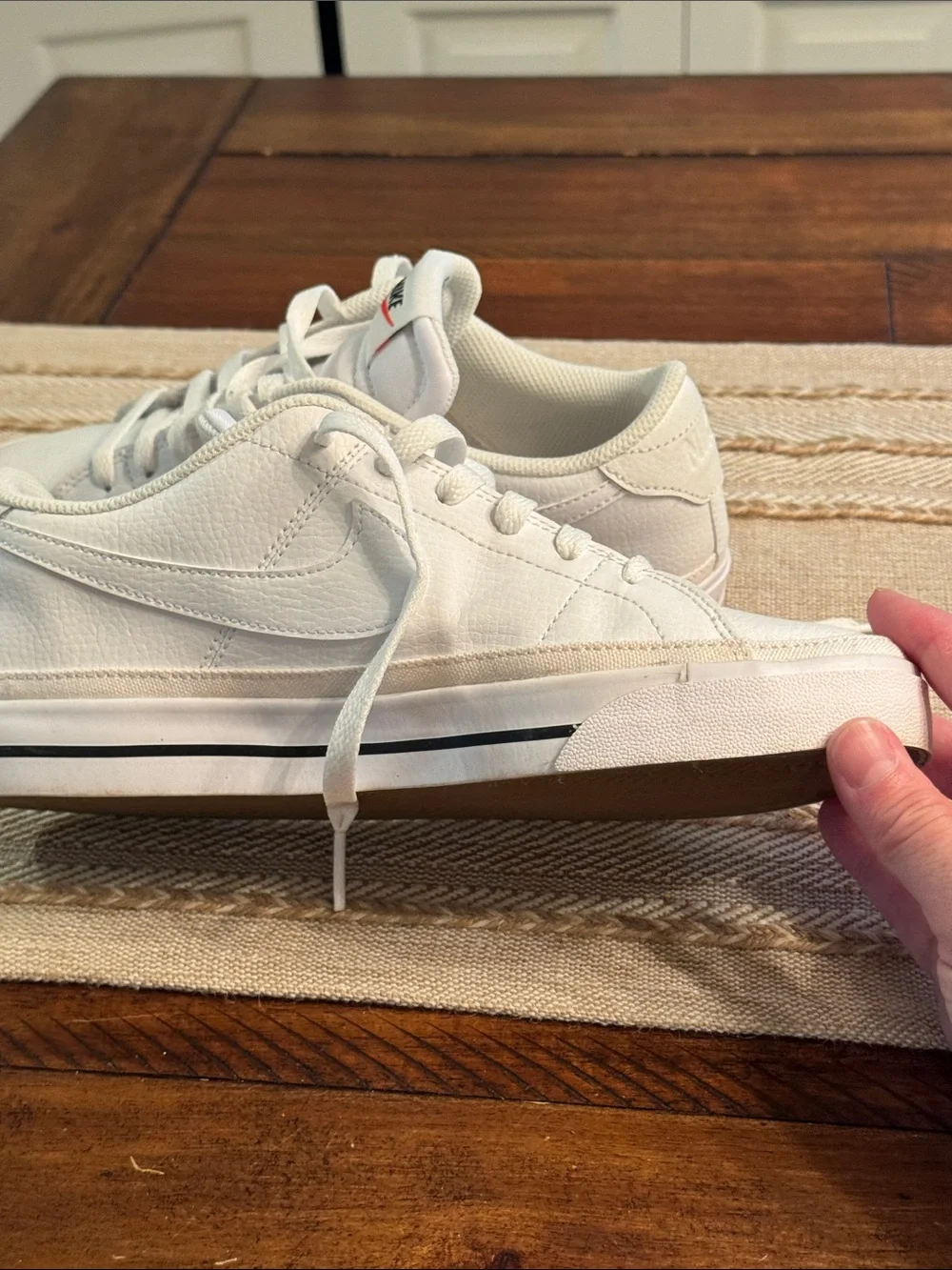 Nike White Low-Top Sneakers with Red Tongue Logo